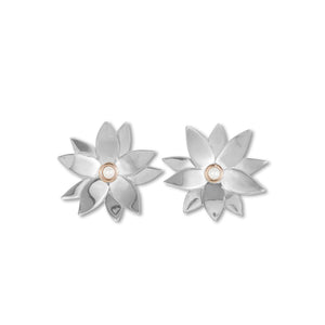 Kelly Woodcroft Daintree Bloom earrings feature stainless steel flower forms with seed pearls set in rose gold.