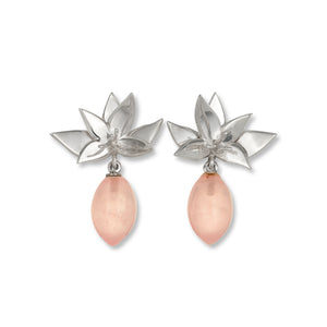 Kelly Woodcroft Brisbane made earrings featuring silver orchids and rose quartz drops. 