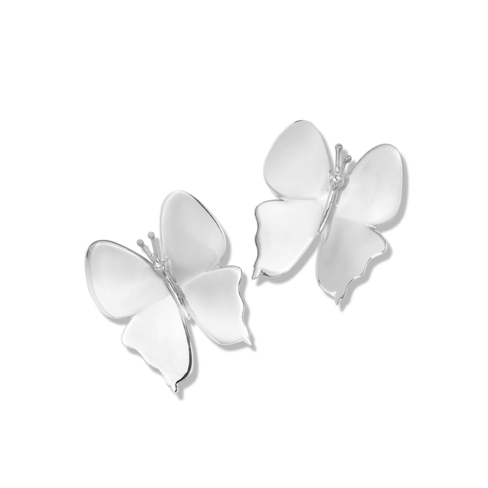 Kelly Woodcroft hand cast silver ulysses butterfly shaped earrings in silver.